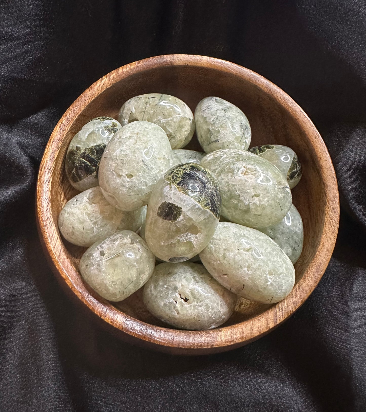 Prehnite with Epidote tumbled stone, pale yellow-green prehnite veined with dark green epidote