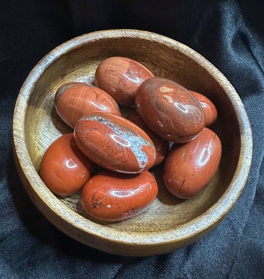 Red Jasper tumbled stone, opaque brick-red, lightly mottled