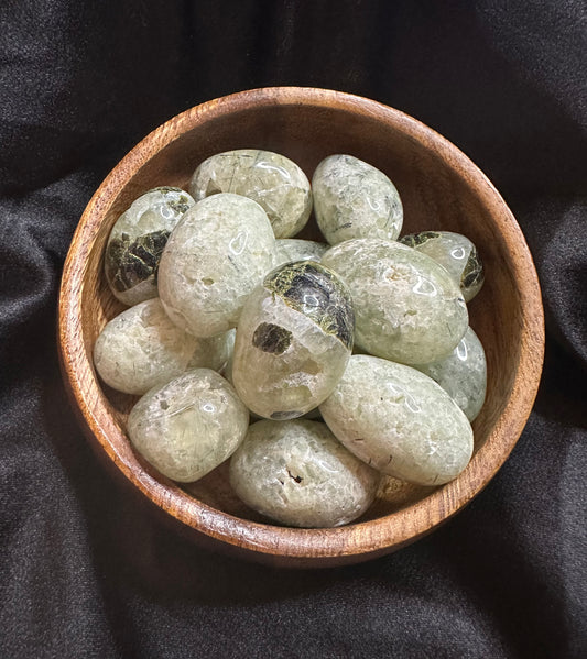 Prehnite with Epidote tumbled stone, pale yellow-green prehnite veined with dark green epidote