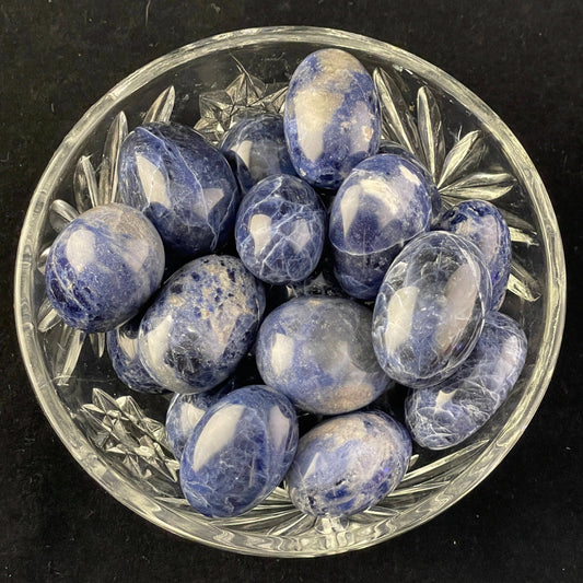 Sodalite tumbled stone, deep royal blue marbled with white