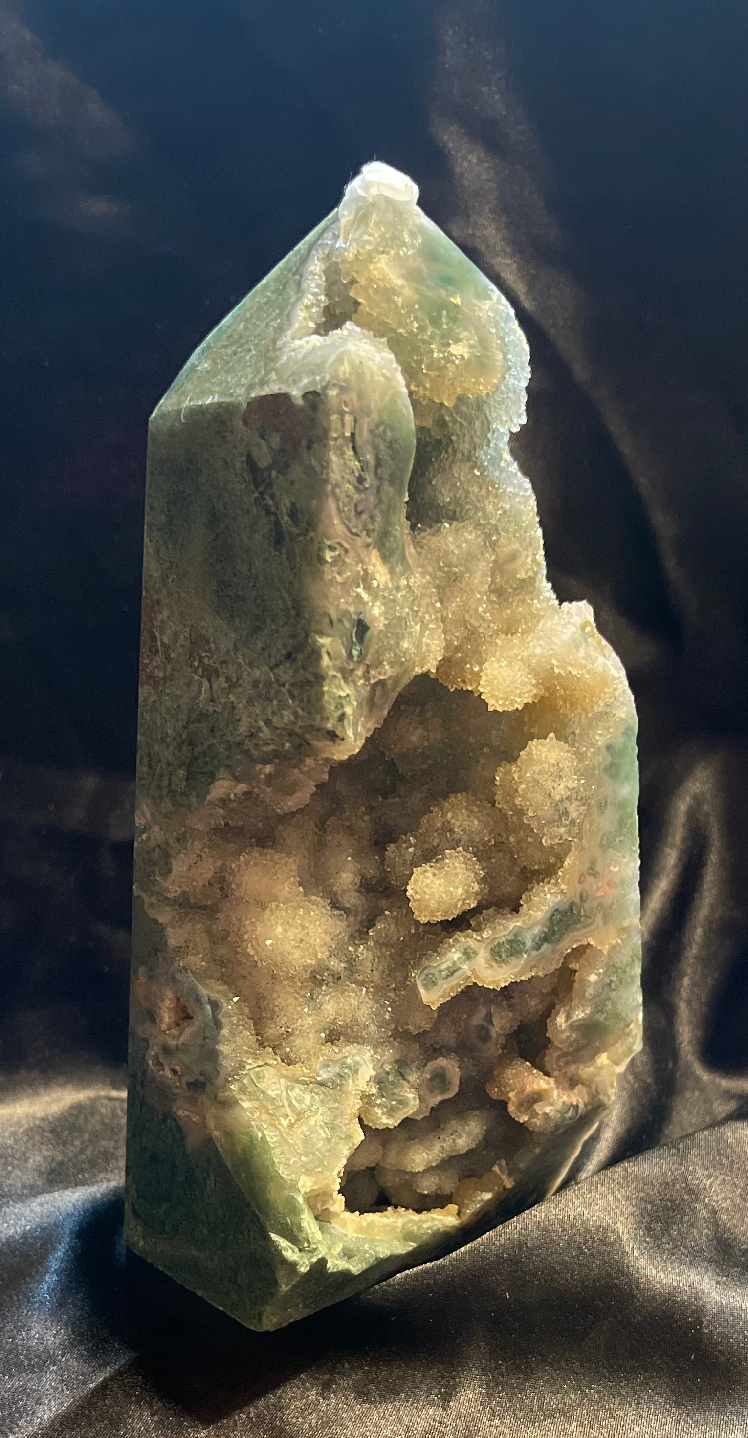 Moss Agate Druzy crystal tower, turned to catch the light