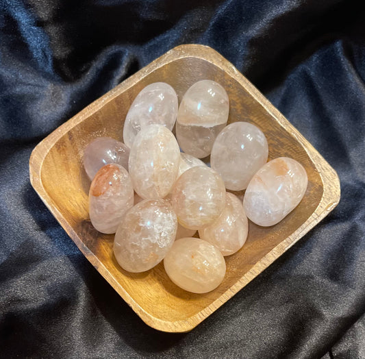 Fire Quartz tumbled stone, clear quartz shot with rusty red hematite