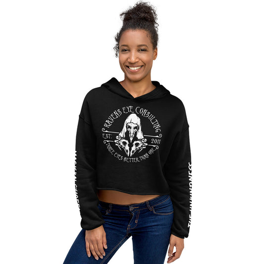 Crop Hoodie in black, carrying the Raven's Eye Consulting design